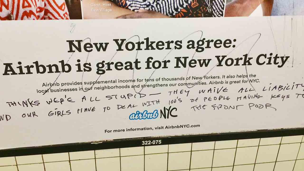 Defaced Airbnb Poster in New York City, July 2014.  Photo: <a href='http://d.fastcompany.net/multisite_files/fastcompany/poster/2014/07/3033191-poster-p-1-airbnb-ads-guerilla-vigilante.jpg' target='_blank'>FastCompany</a>